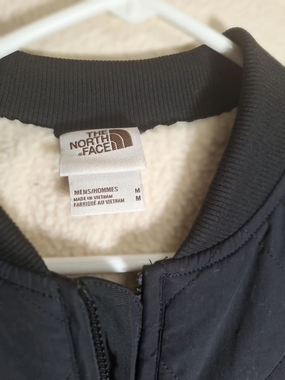 The North Face Black Quilted Vest with Sherpa Lining